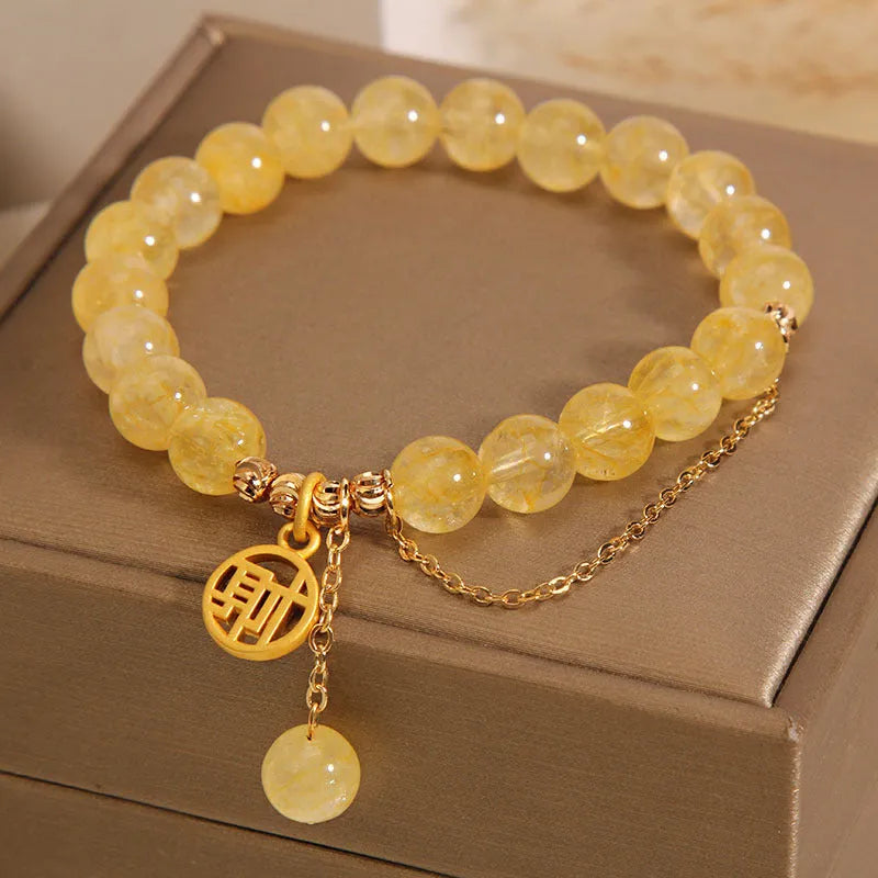 Citrine stone bracelet with Chinese character tassel in mixed materials