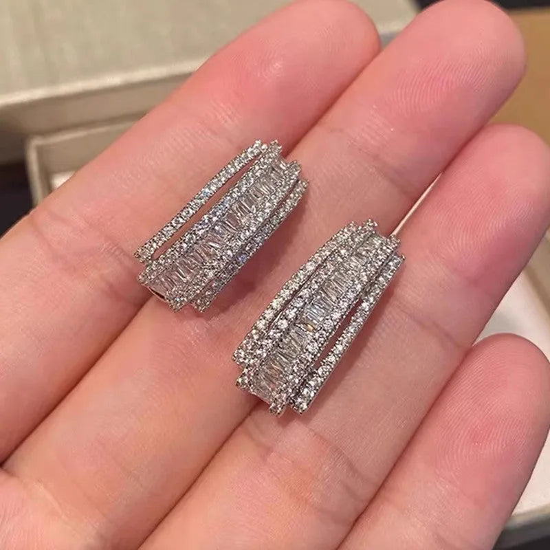 Geometric-shaped copper stud earrings with zircon white gold colour finish for women