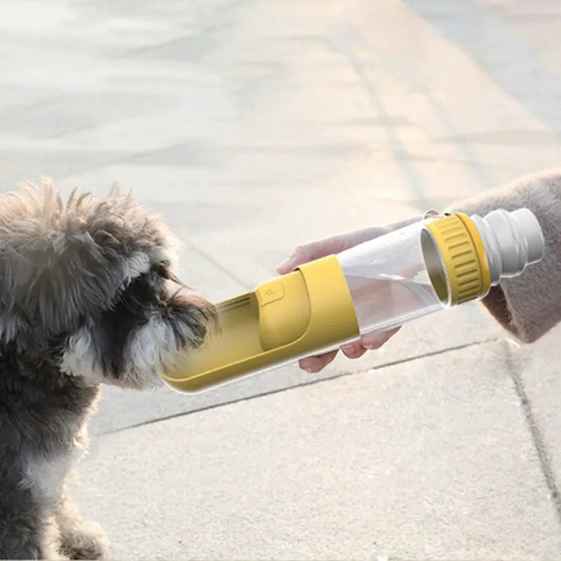 Dark blue portable dog water bottle with integrated drinking bowl, shown with leak-proof lock.