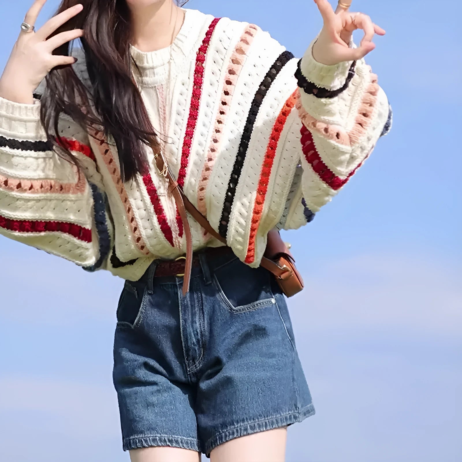 Rainbow striped loose pullover sweater with hollow knit texture and batwing sleeves