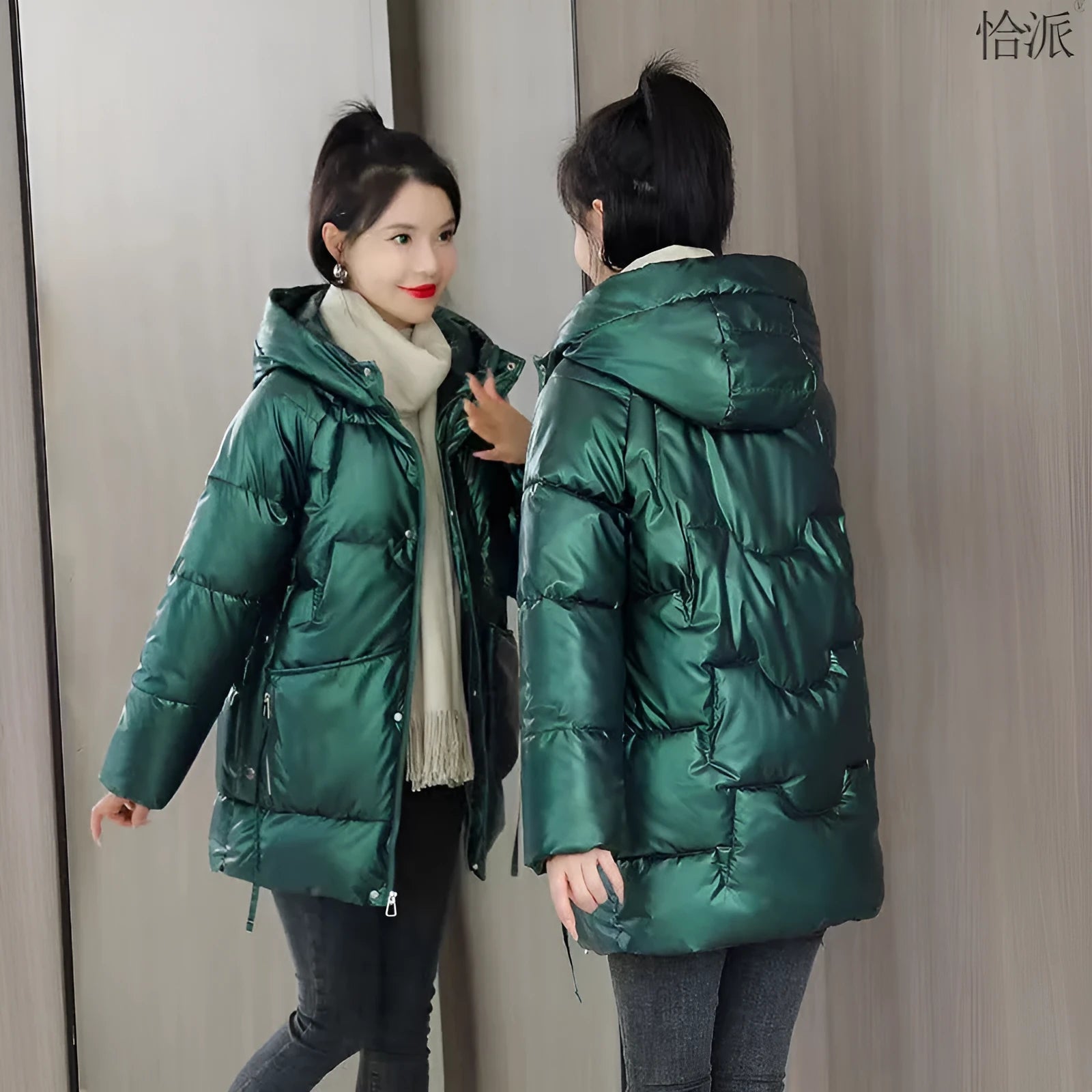 Women's loose thick hooded winter jacket in green, shown with long sleeves and a front zip.