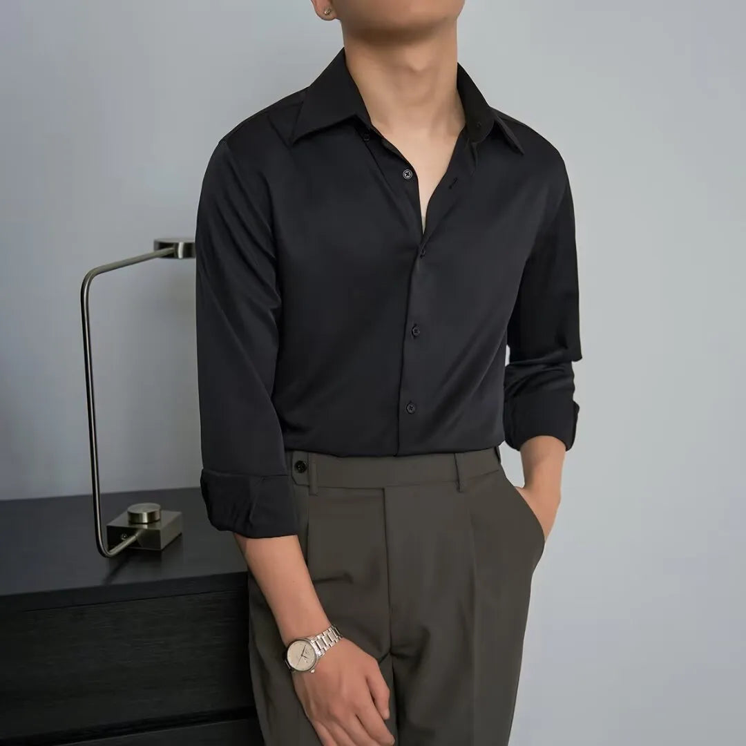 Man wearing a black slim-fit Japanese retro style long sleeve cardigan shirt.