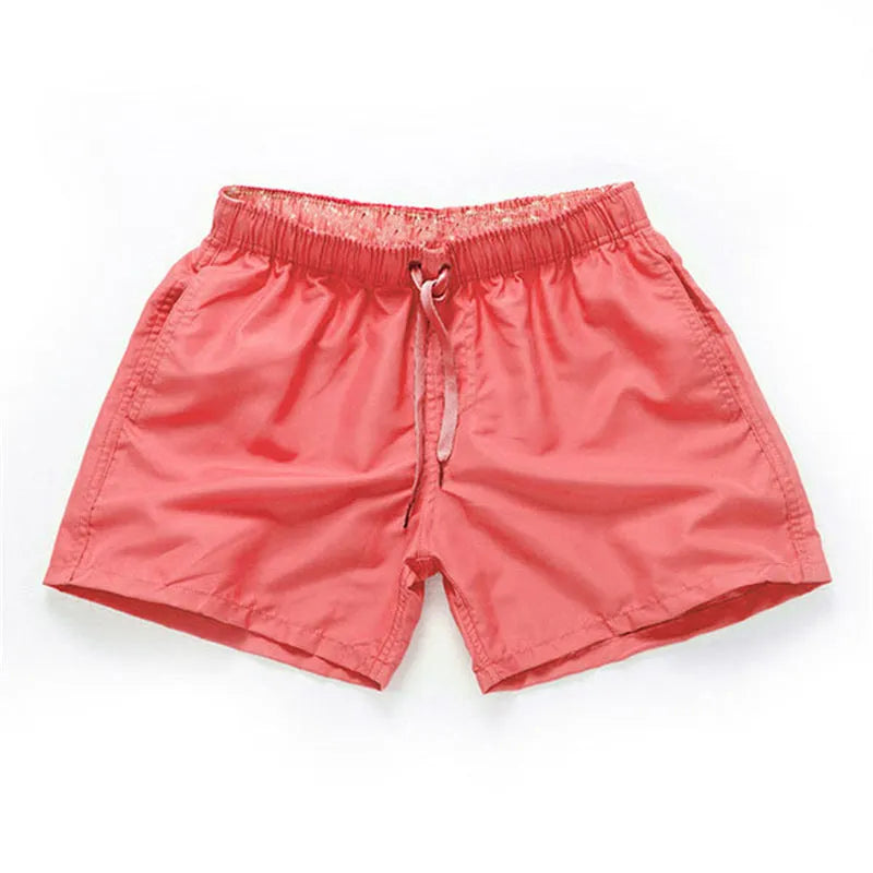 Men's polyester beach shorts in multiple colours with straight leg opening, suitable for surfing and swimming