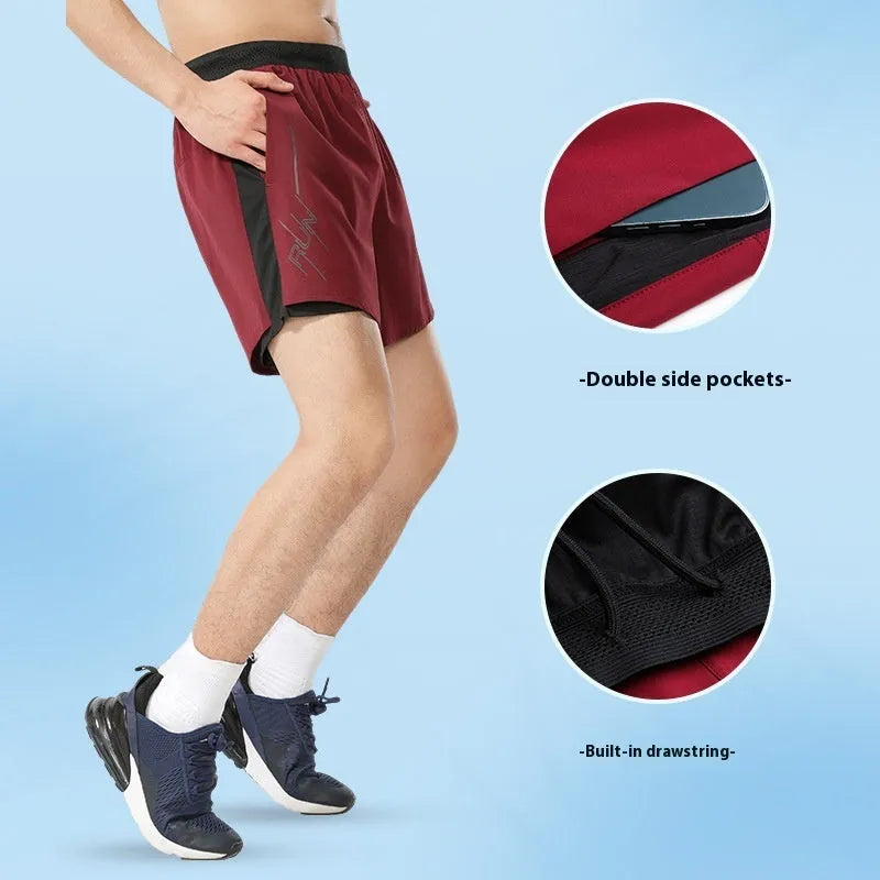 Men's solid colour polyester basketball shorts on a hanger, showing low-waist design.