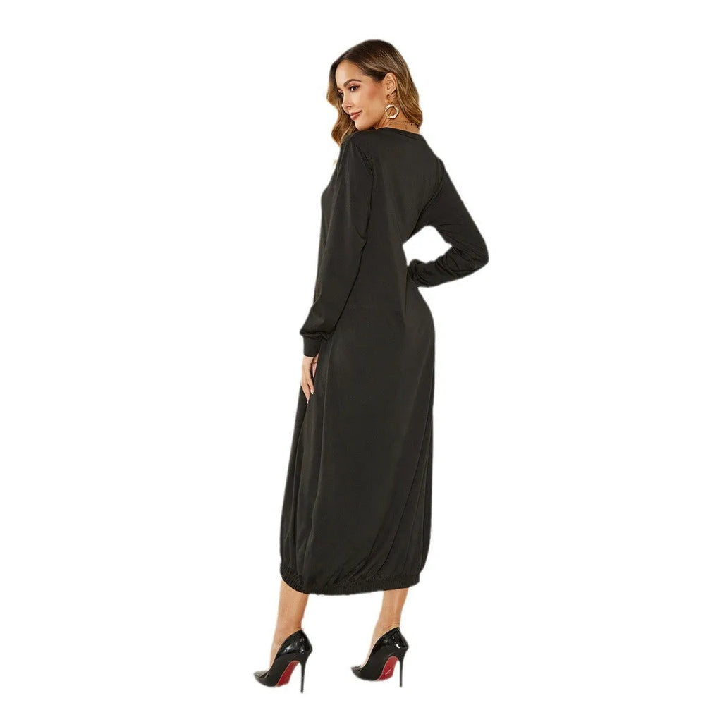 Loose long black lantern dress with a lace-up crew neck, showcasing a casual pullover style.