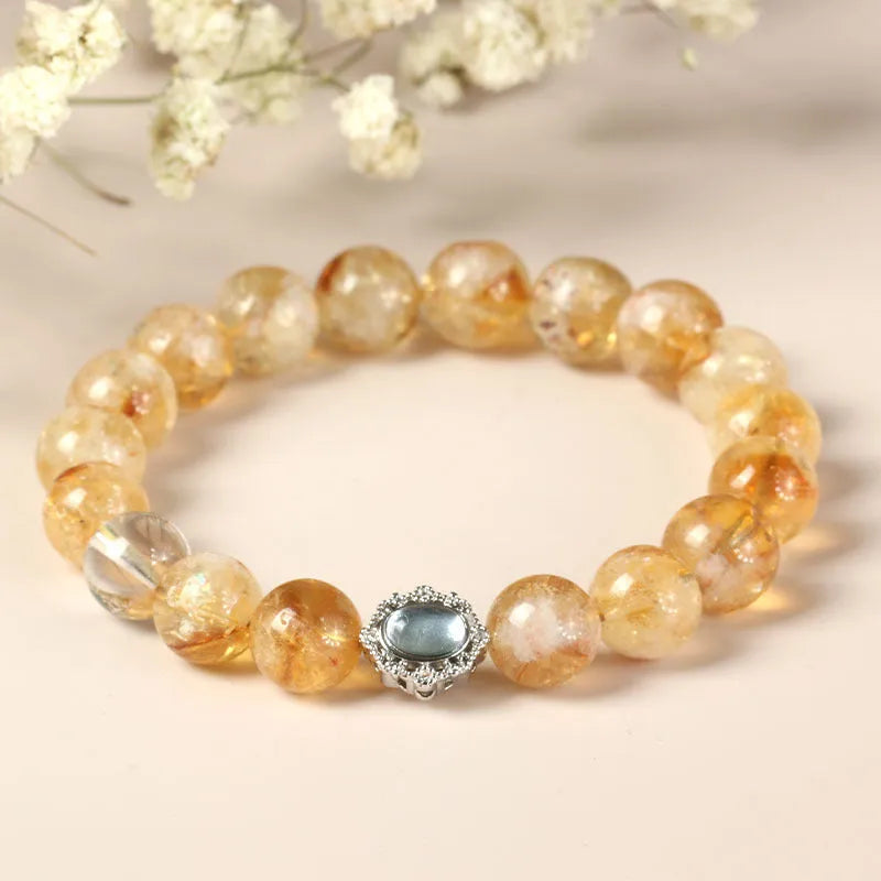 Geometric citrine crystal bracelet with 10mm polished stones on wrist