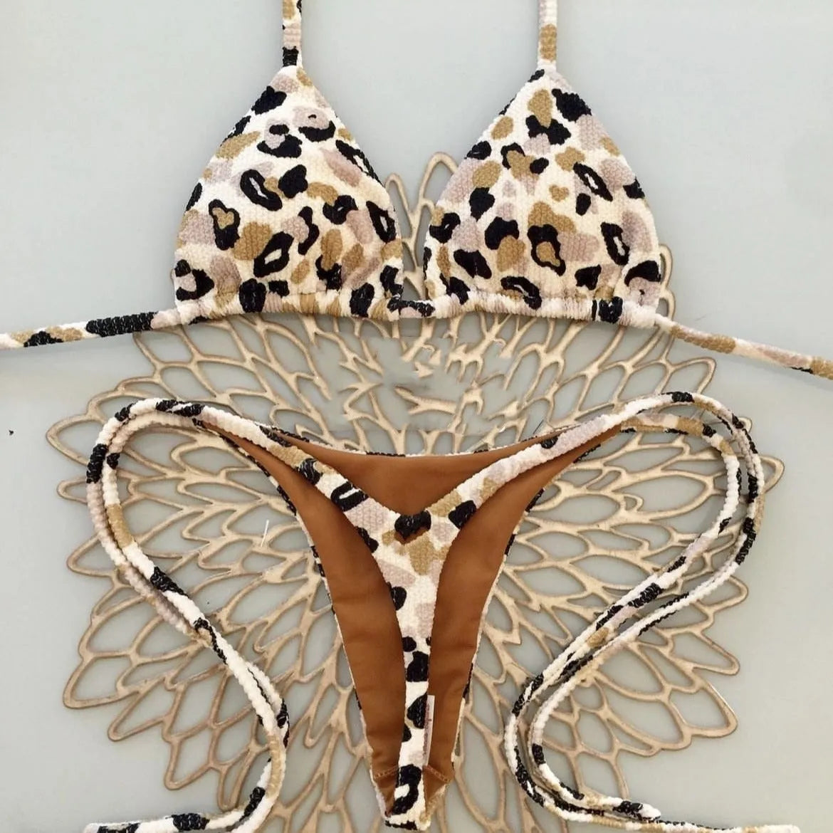 Women's printed bikini swimsuit with quick-drying fabric shown in one of three available colour options