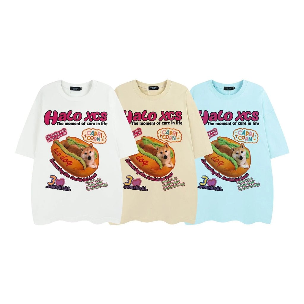 White loose-fit cotton t-shirt featuring a colourful cartoon print of a hamburger and a dog.