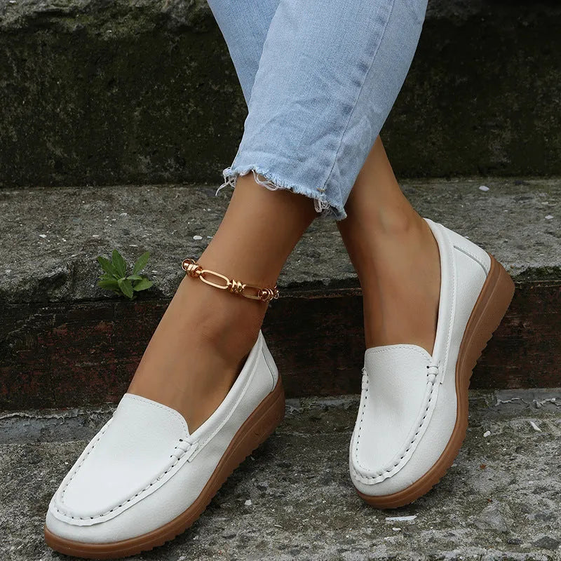 Women's flat loafer shoes in PU leather, shown in multiple colours with round toe and rubber sole.