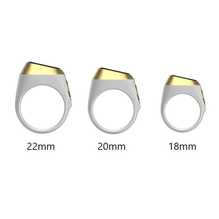 Zikr1 smart ring in silver on a charging cable next to its case, showing the OLED display.