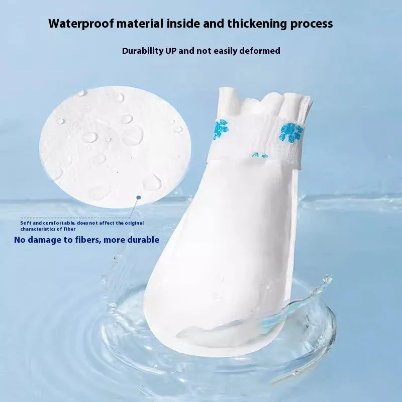 Pack of 20 white disposable waterproof shoe covers for dogs on a blue background