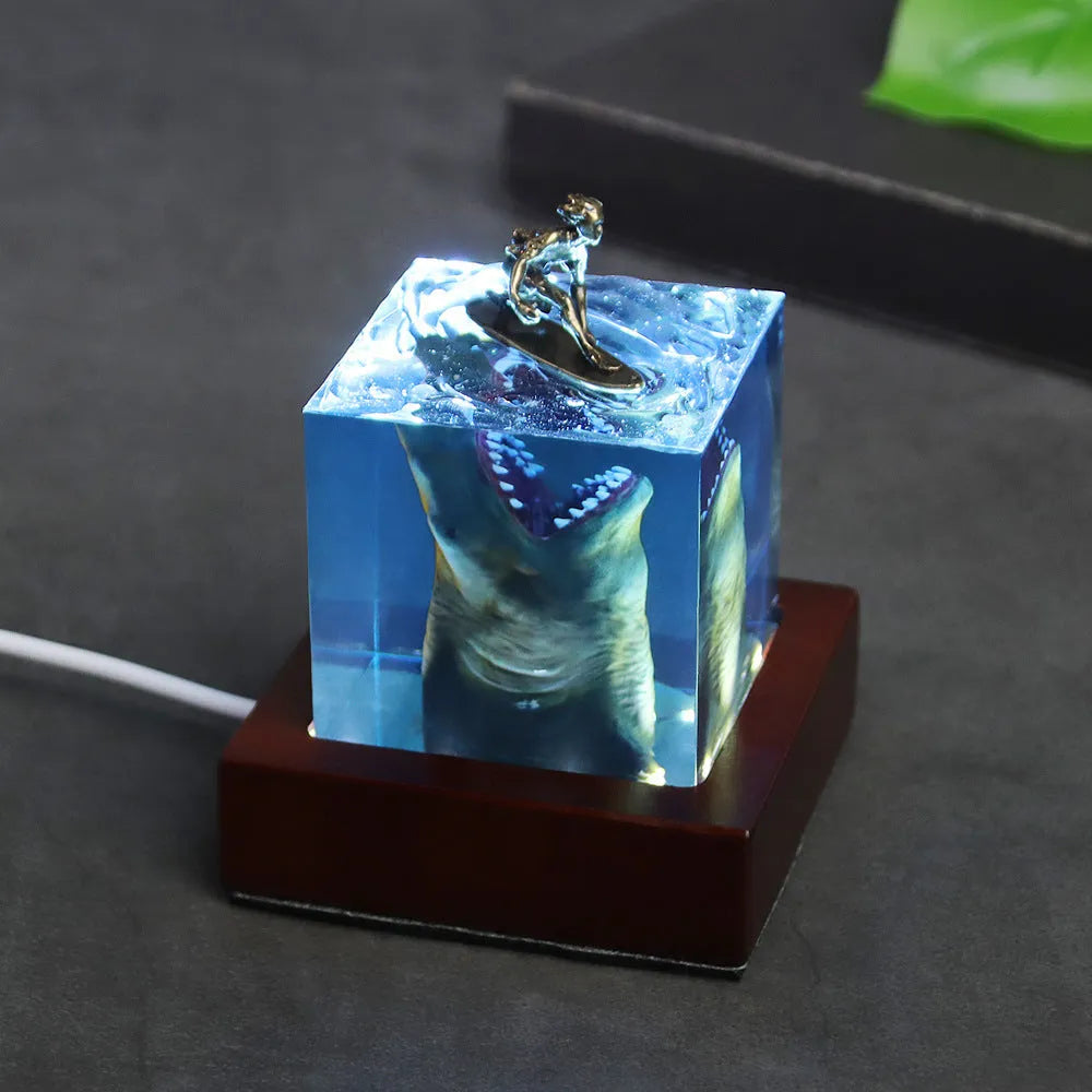 Surfing shark micro landscape resin night light ornament on wooden surface