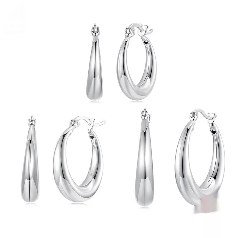 Copper alloy geometric ring ear clip earrings with silver needle closure in three size options