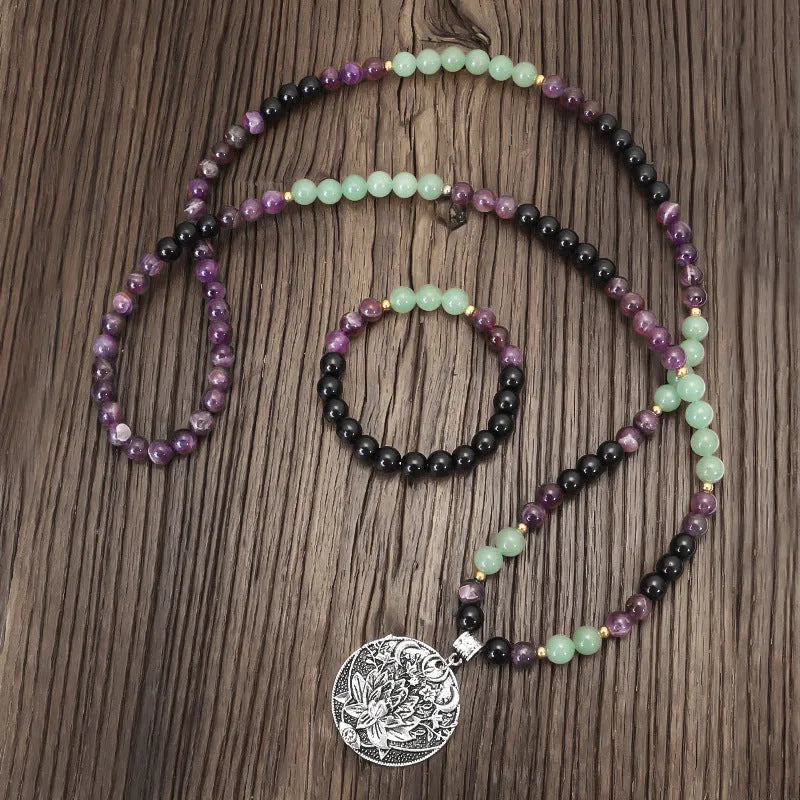 Dongling Long handmade stone bead necklace with alloy lotus pendant and matching bracelet, adjustable length.