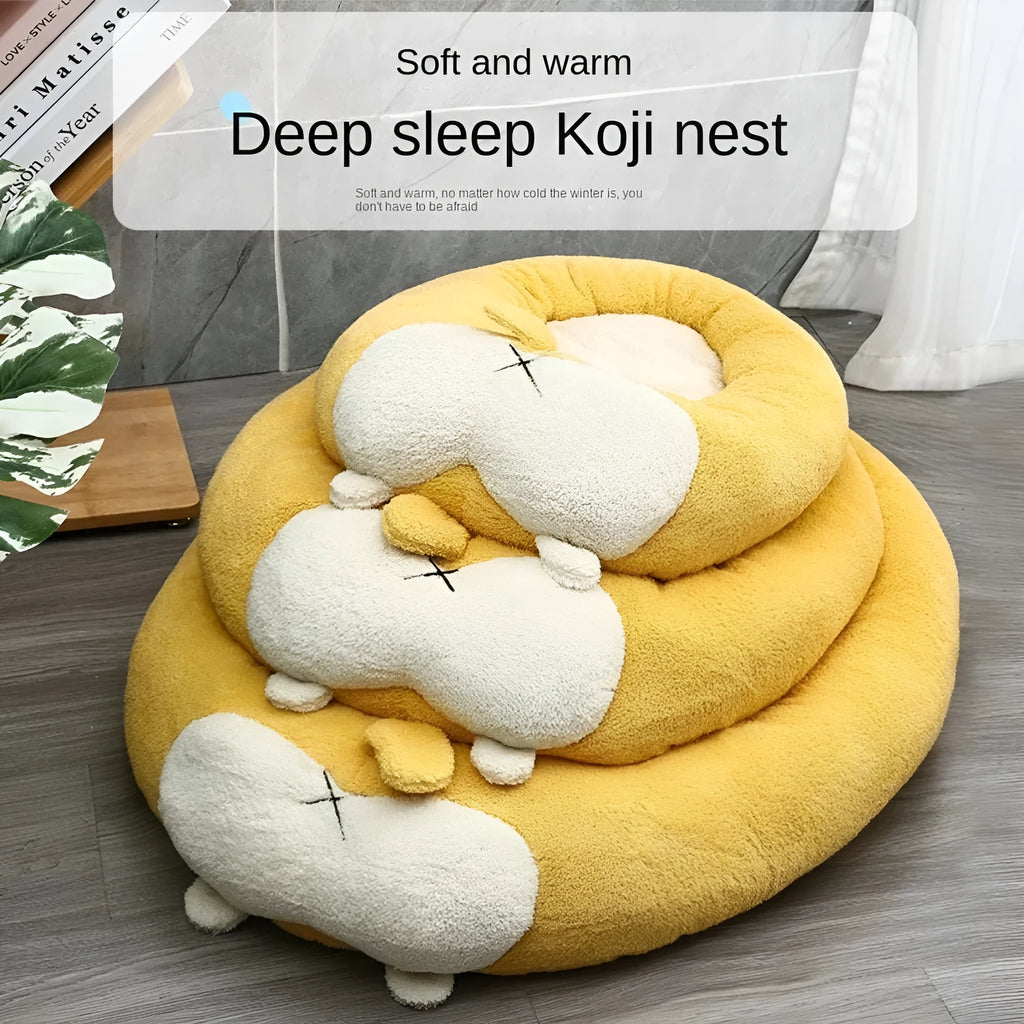 Brown and white corgi-shaped plush pet bed for dogs or cats on a wooden floor.