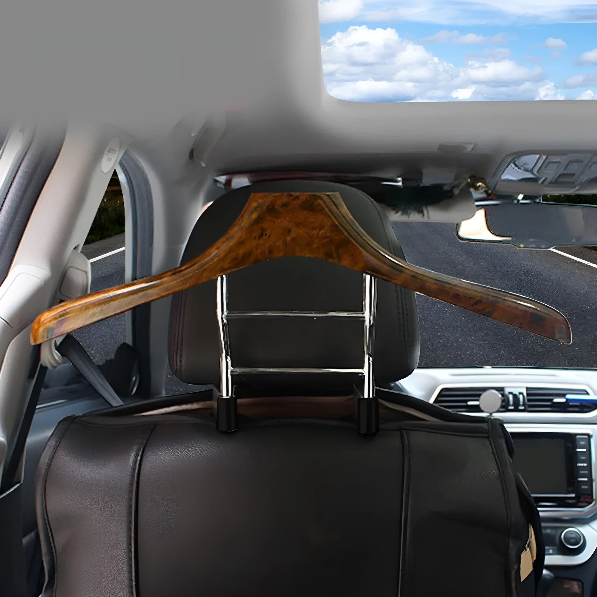 Wood yellow stainless steel car mounted clothes hanger holding a suit jacket on a car seat