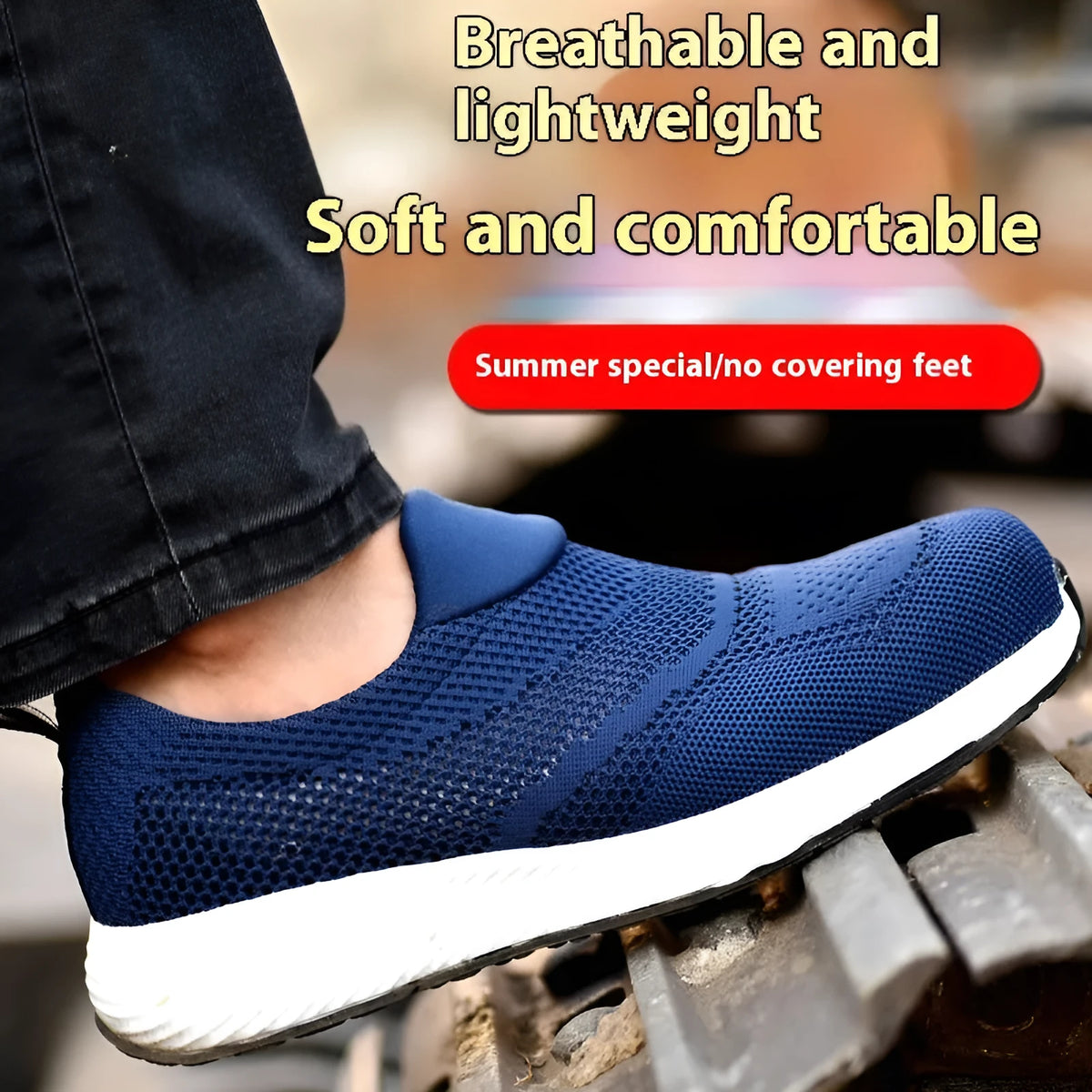 Men's lightweight black mesh steel toe safety work shoe on a grey background