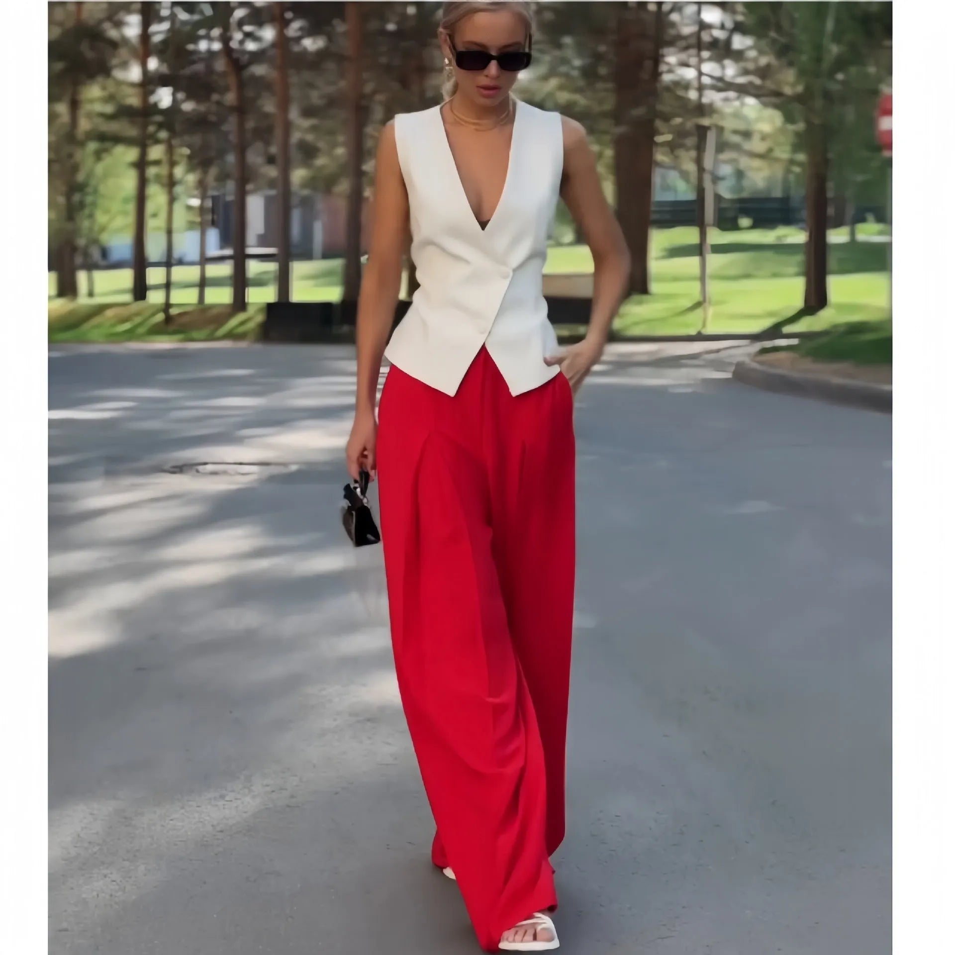 Women's beige deep V-neck sleeveless top with matching high-waist wide-leg trousers two-piece set