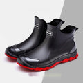 Short tube PVC wading shoe with round toe and non-slip plastic sole on a wet surface.