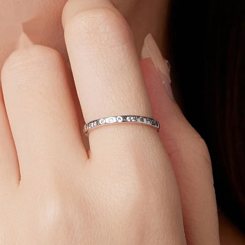 Moss Password I Love You silver ring with black oxidation finish showing discreet text engraving