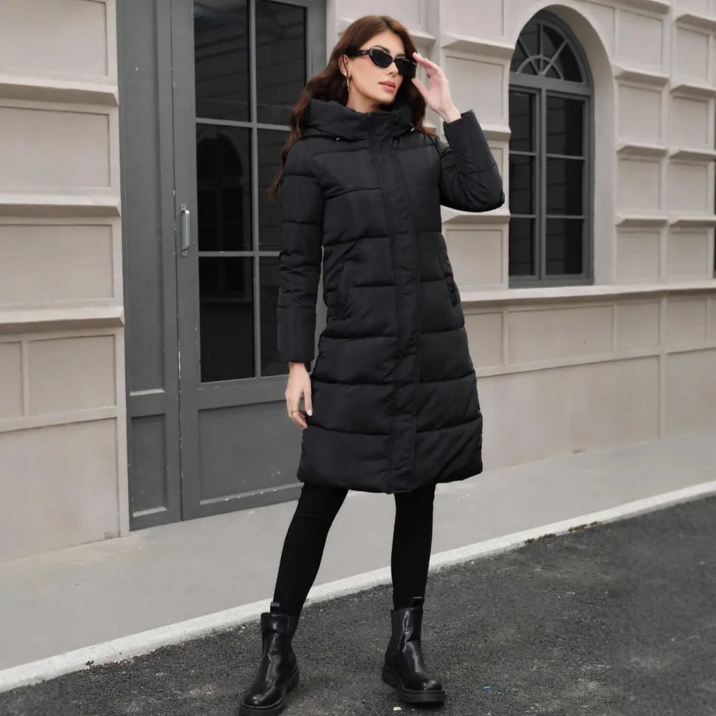 Black hooded slim fit long winter jacket for men on a hanger