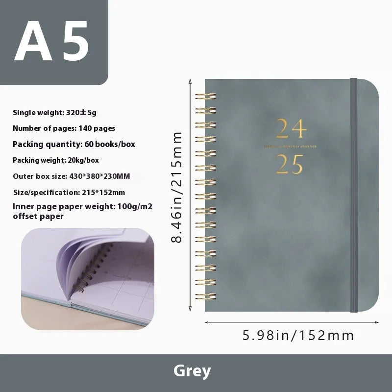 A5 size PU leather notebook with metal coil binding in a choice of colours including black, blue, brown, and pink.