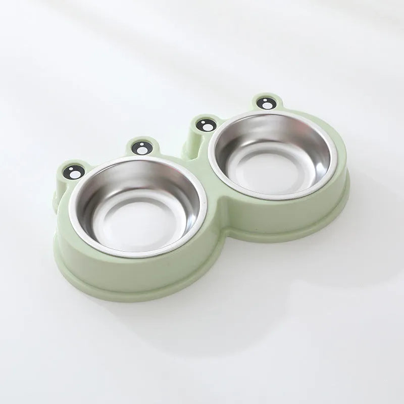 Stainless steel double pet bowl with frog-shaped non-slip base in blue, green, and pink colours