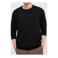 Men's regular fit wool pullover sweater in light grey, shown on a model.