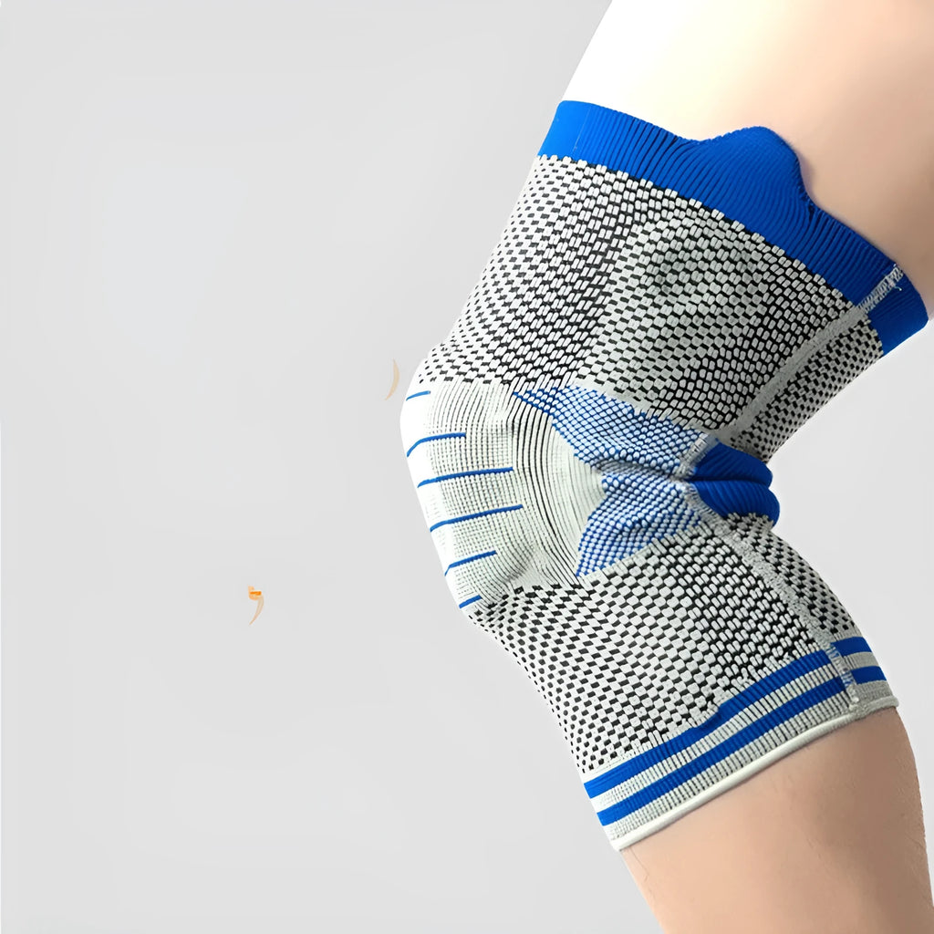 A cotton knee pad with a visible silicone massage spring bar shock absorber, shown in a grey and blue colour combination.
