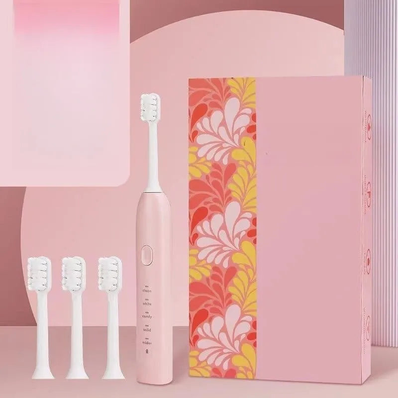 Yellow duck design USB rechargeable electric toothbrush with soft bristles on a bathroom counter.
