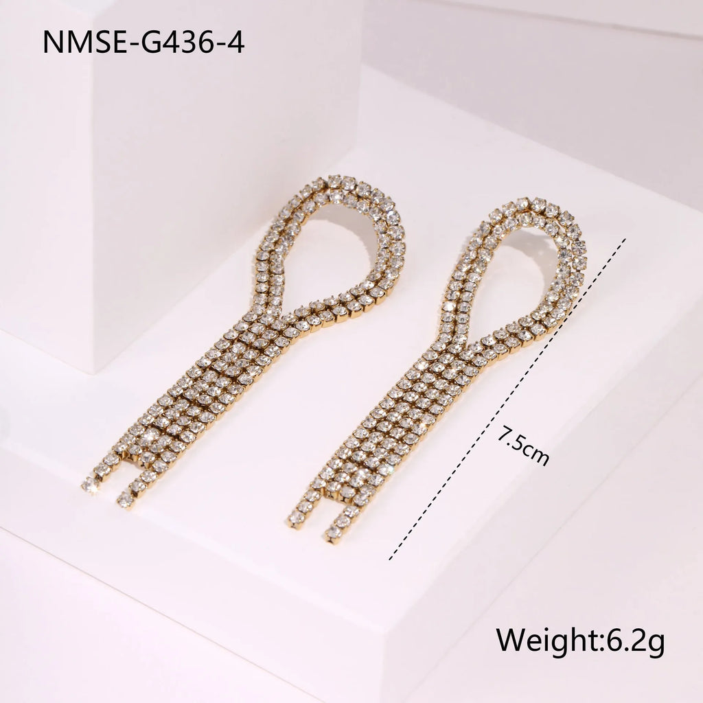 Women's stainless steel earrings with diamond tassel, heart, and star shapes in 18K gold electroplated finish.