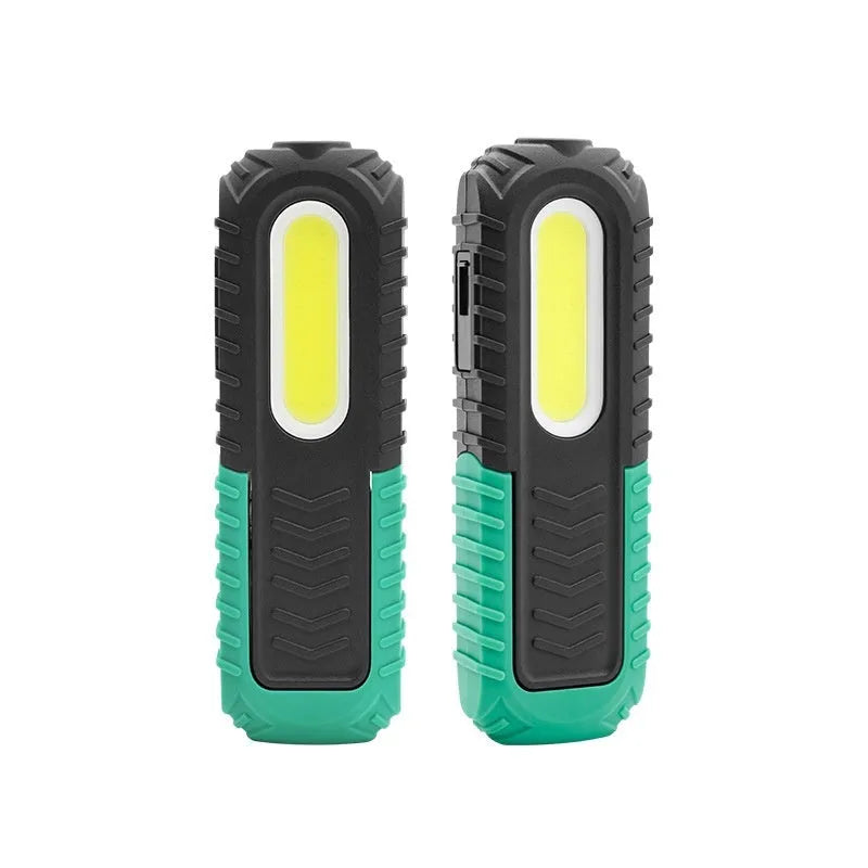 Black and green auto repair work light with USB charging cable for vehicle maintenance