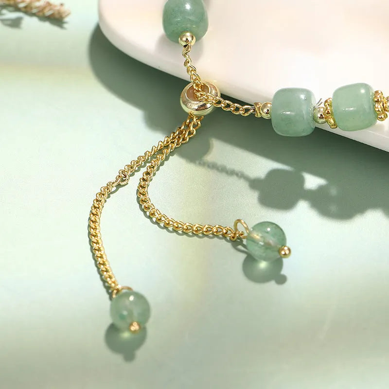 Rabbit bracelet with natural stone charms including green aventurine or strawberry quartz options with mixed metal components
