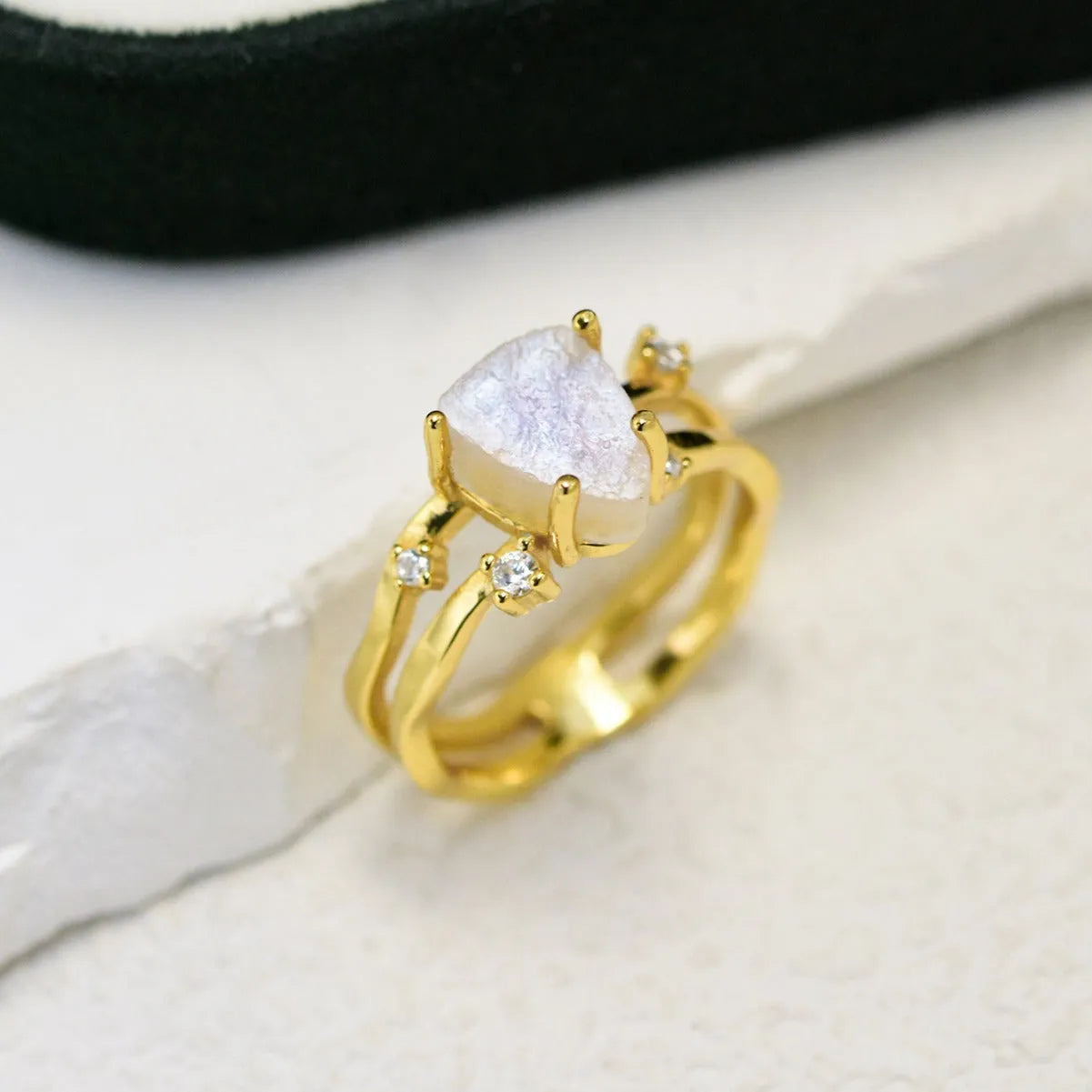 S925 sterling silver irregular triangle ring with a moonstone in rose gold, white gold, or yellow gold finish.