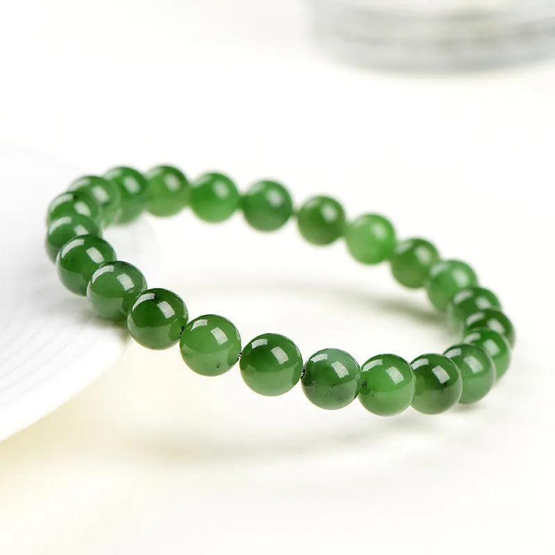 Natural jasper ball bracelet handcrafted from Hetian jade with polished stone beads