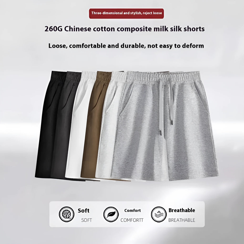 Men's straight leg cotton sports shorts in light grey on a hanger.