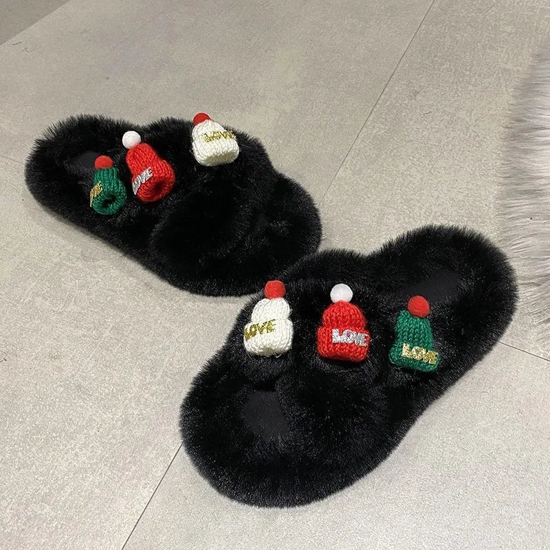 Women's black Christmas hat decoration faux plush slippers with a rubber sole.