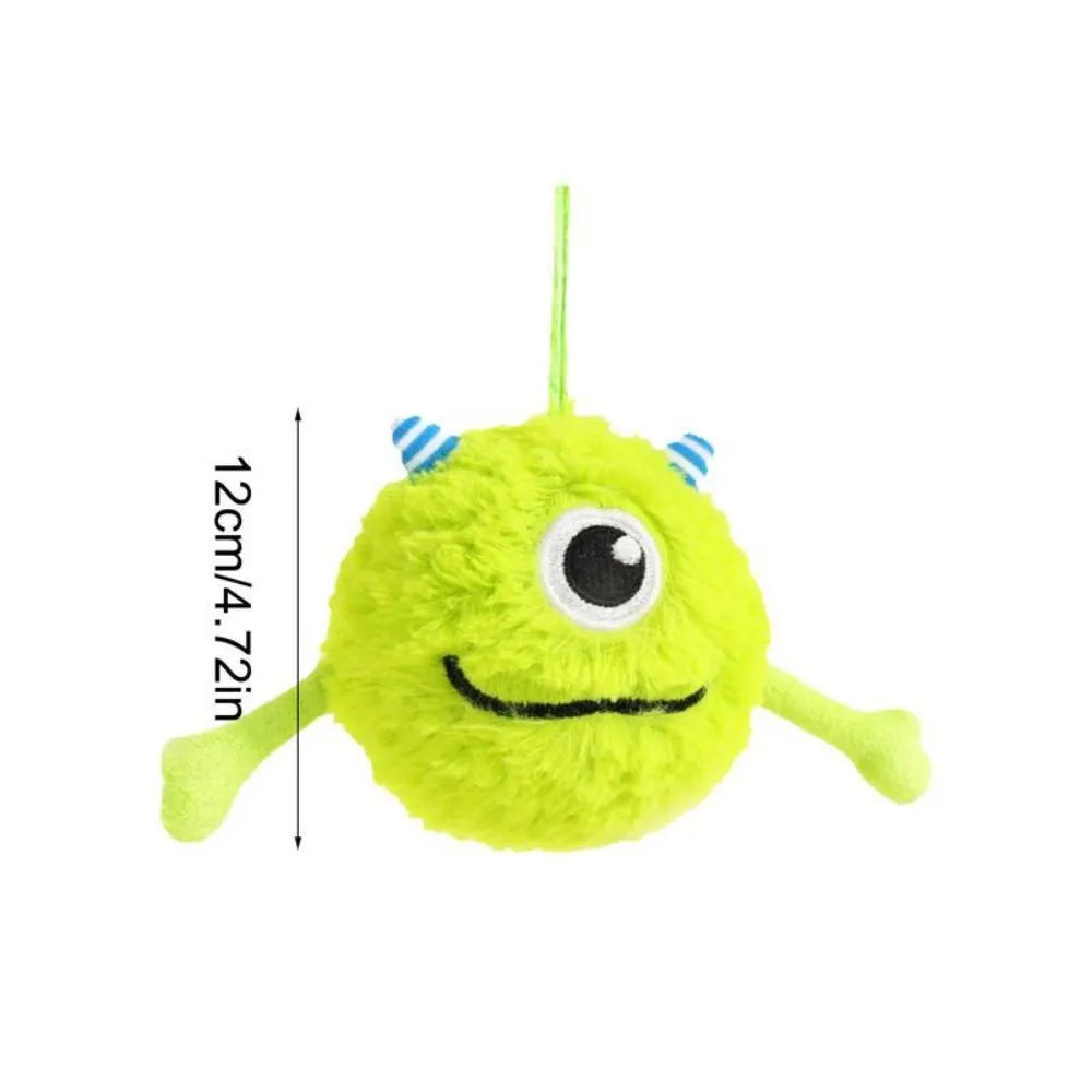 Green interactive dog toy ball with plush exterior and sound activation feature
