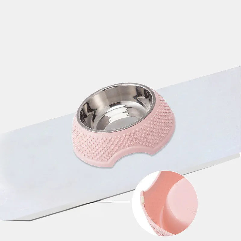 Set of four stainless steel pet bowls with non-slip bases in blue, green, and pink colours