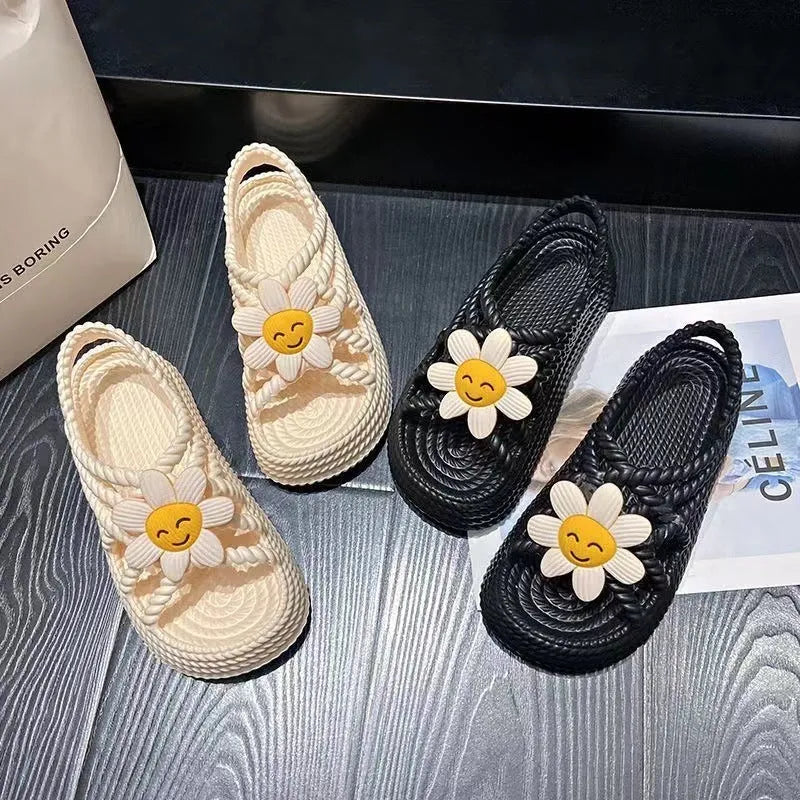 Beige PVC women's sandals with a sunflower decoration and round toe