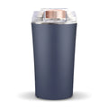 Blue mini flour mill and grain grinder machine with stainless steel construction on a kitchen counter.