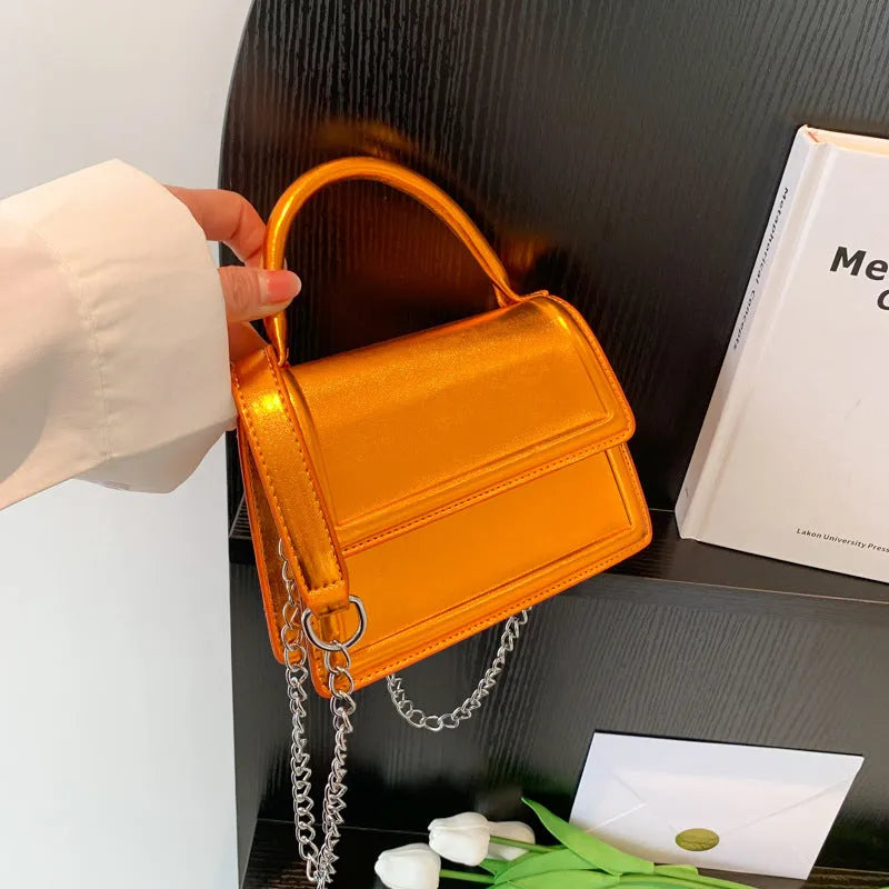 Retro PU leather crossbody bag in horizontal square shape with visible sewing lines