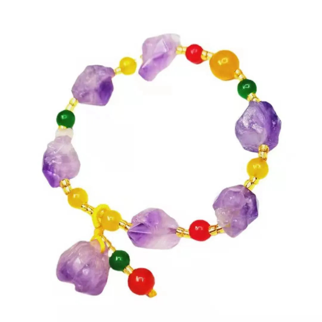 Natural shaped purple amethyst bead bracelet for women with a fu character charm.
