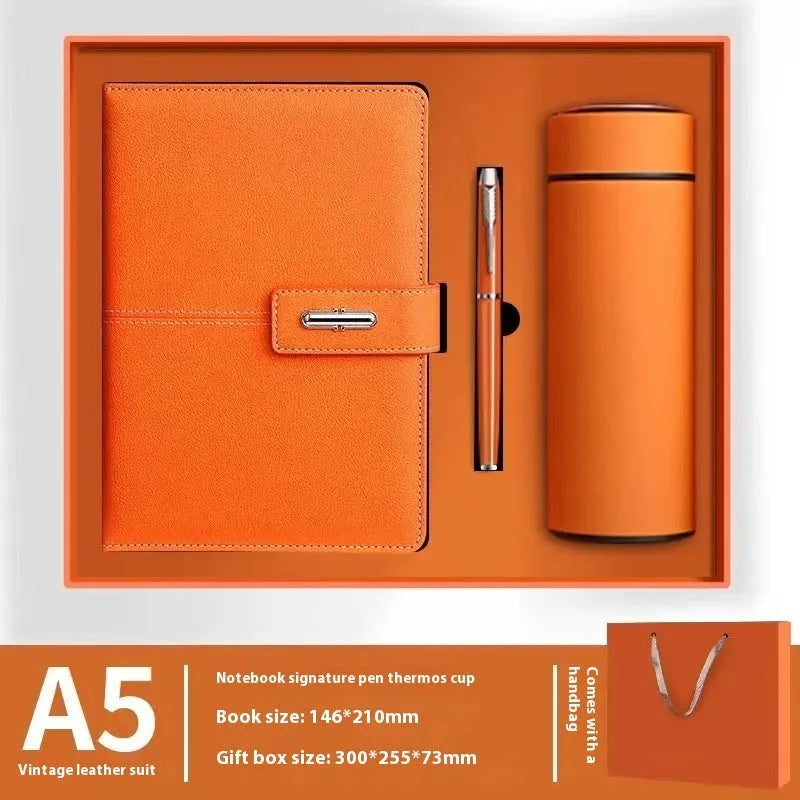 A5 notebook with imitation leather cover in various colours including black, red, green, blue, and orange.