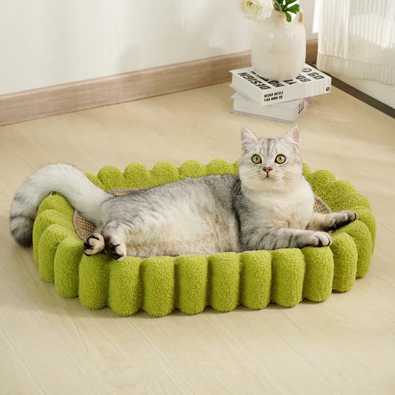 Green oval cat scratch pad bowl with sisal scratching surface measuring 650x420mm