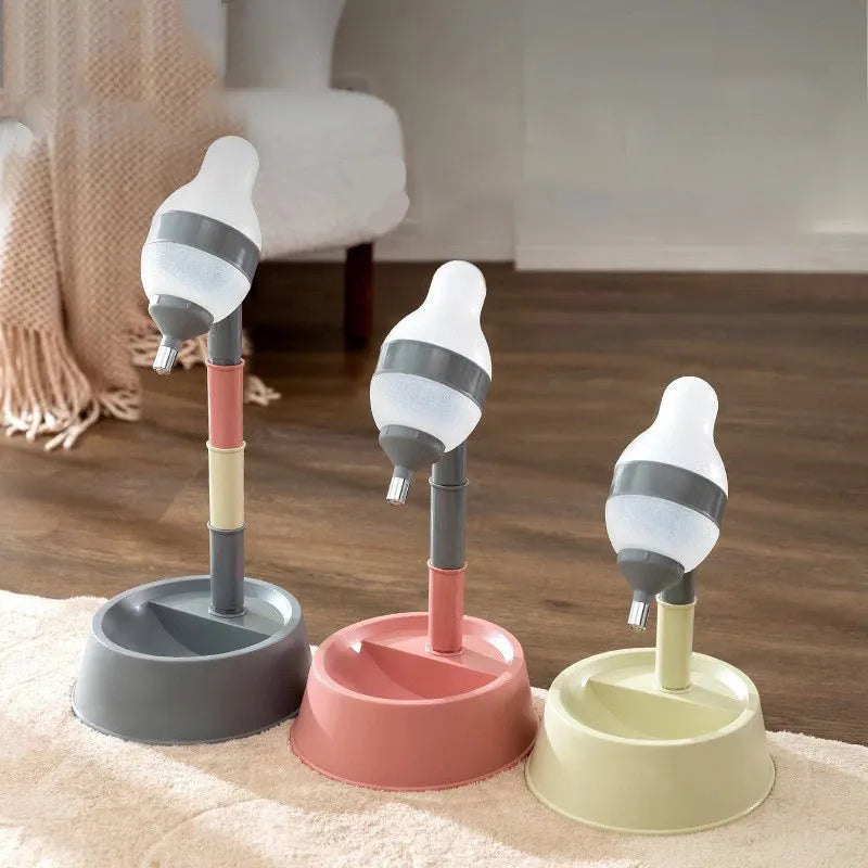 Grey adjustable height pet water dispenser with detachable pole and separate bowl on a wooden floor.