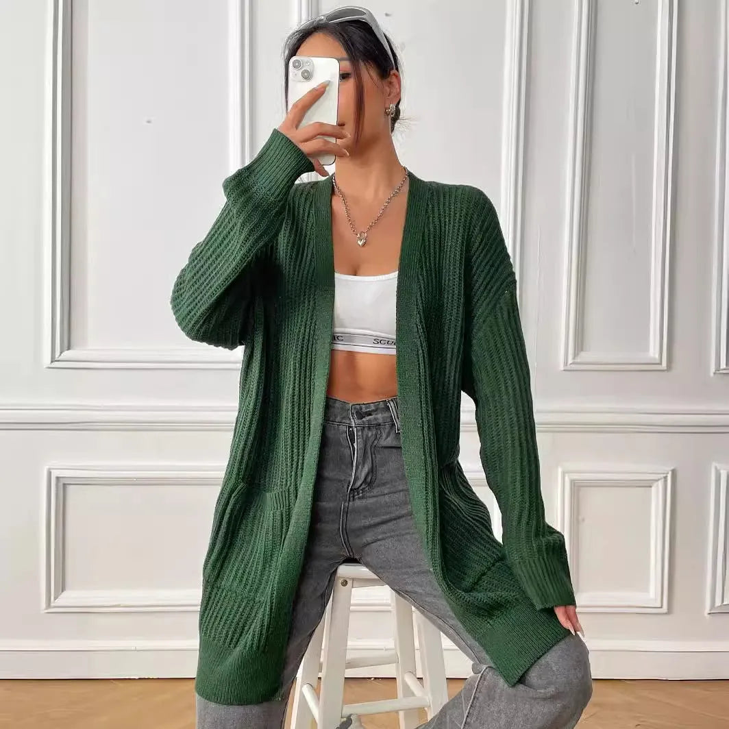 Women's loose fit acrylic cardigan sweater with double pockets in dark green colour