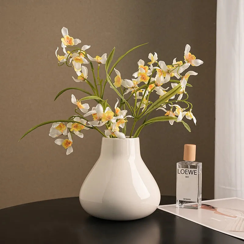 Ceramic decorative vase with glass surface in black or white colour with round belly French design