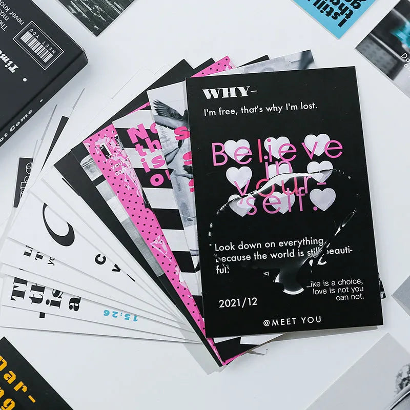 Box containing two creative printed postcard designs for blessing messages and personal notes.
