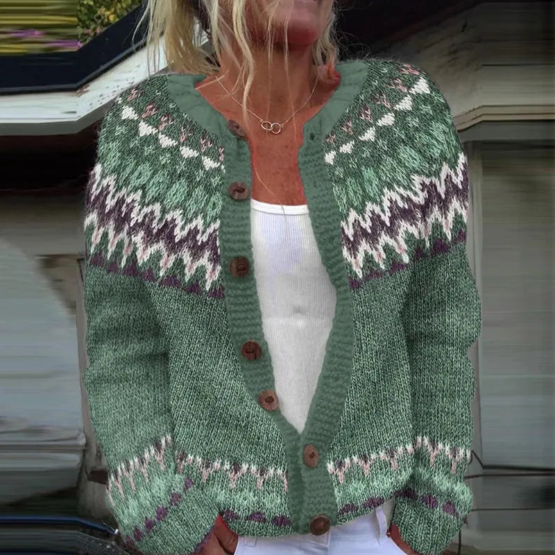 Yellow digital print cardigan knit coat with a raised 3D pattern on a hanger.